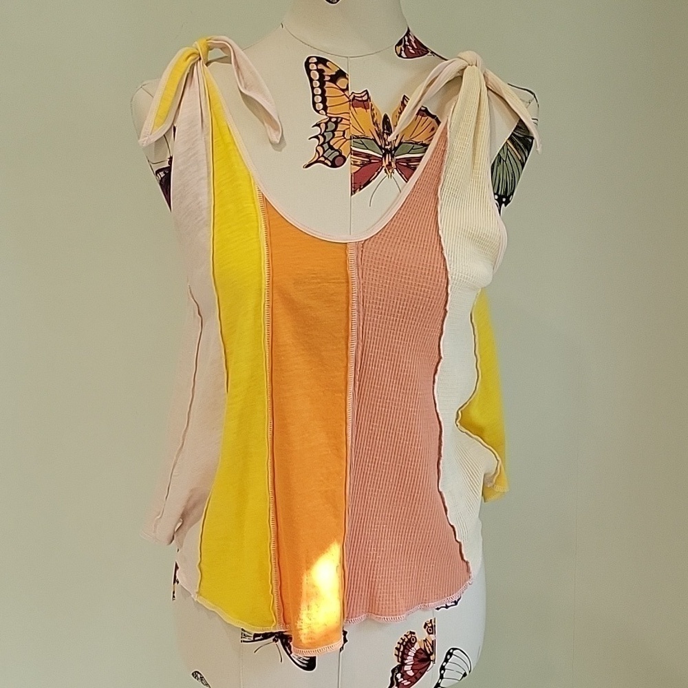 FREE PEOPLE tank top with multi panels.  Ties at the shoulder size is XS. Boho.